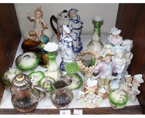 SECTION 32. A group of various porcelain figures and some other small ceramic items including lidded dishes and a pair of can