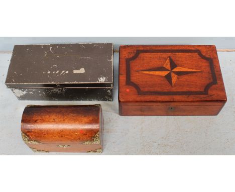 An oak stationary box with hinged oval top and brass detailing, together with a wooden box, the top inlaid with compass rose 