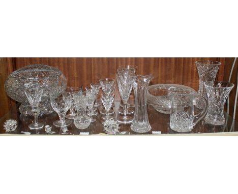 A collection of assorted glass items comprising of a large rose-bowl, vases and drinking glasses etc including some examples 