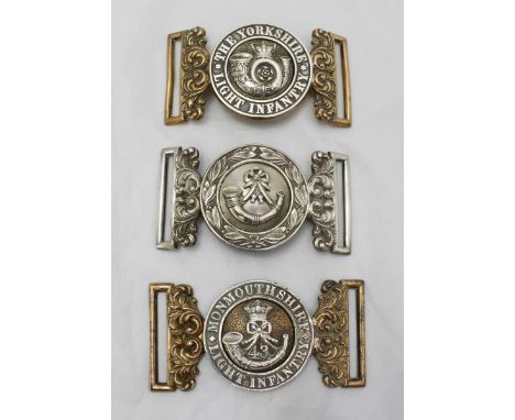 An Oxfordshire & Buckinghamshire Light Infantry two-piece white metal belt buckle, together with a white-metal and brass 'The