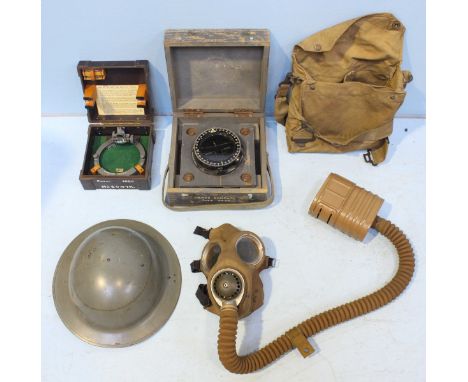 A WW2 military helmet and a 'Barringe Wallis and Manners' Naval gas mask, together with a compass housed in fitted case marke