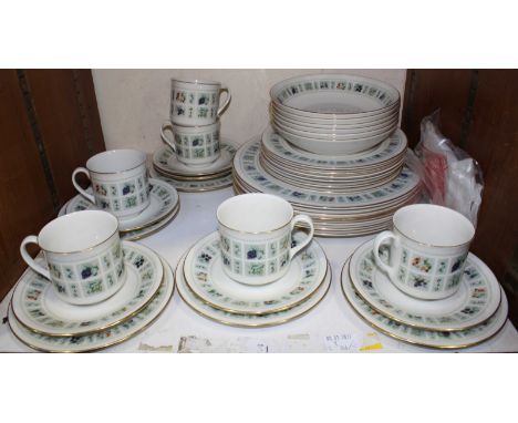 SECTION 31. A Royal Doulton 'Tapestry' pattern tea and dinner set, including tea cups, saucers, dinner plates and more, 35 pi