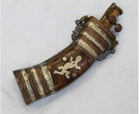 A late 19th / early 20th century Persian metal-mounted cow horn powder flask, with alternating yellow and white-metal scrollw