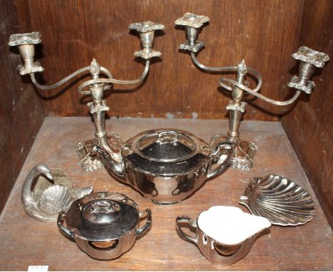 SECTION 44. A Gray's pottery 'silvered' tea set, comprising of a teapot, lidded sugar bowl, cream jug and shell moulded dish,