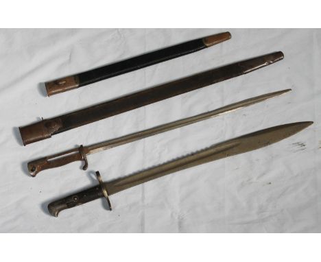 A British 1875 Pattern Sawbacked bayonet, 19 3/4-inch double-fullered blade, typical WD markings, composition grip 'as found,