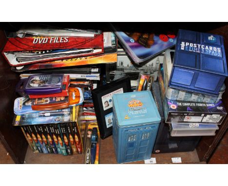 A large collection of Dr Who related items, including Series 1 and 4 of the reboots on DVD, with numerous files relating to t