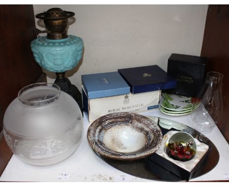 SECTION 3; An early 20th century oil lamp, with shade and chimney, together with a boxed Caithness glass paperweight, six Roy