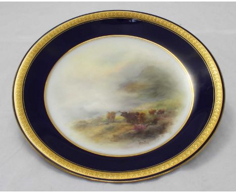 A Royal Worcester cabinet plate painted by Harry Stinton, the front decorated with highland cattle grazing on a mountainous l