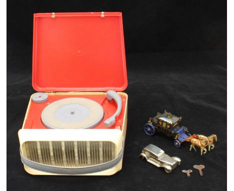 A clockwork tin Royal Coach, horse drawn carriage, circa 1930's from Germany, together with a Triang record player and a cloc