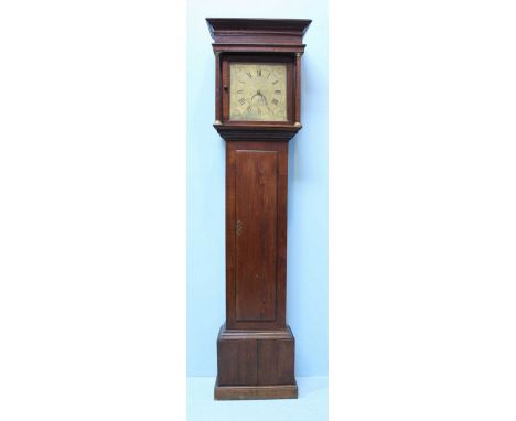 An 18th Century oak, thirty-hour long case clock by 'William Wilks of Wolverton,' the brass dial with Roman numerals denoting