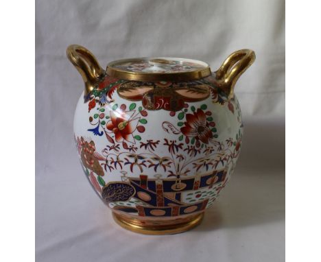 A 19th century Spode twin handled pot pourri jar with inner lid, decorated in the Imari pallette, 21cm high,  CONDITION REPOR