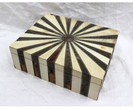 A 19th century Anglo Indian Ivory workbox, with radiating micro mosaic segments, the interior fitted with compartments, reel 