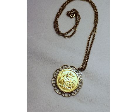 An Elizabeth II gold half sovereign dated 1982 in a 9ct yellow gold slip mount on a 9ct yellow gold chain