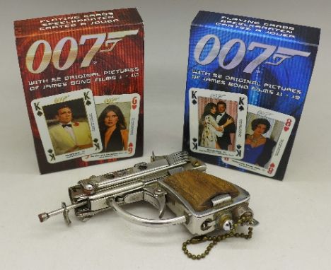 A novelty lighter stamped 007 and two packs of 007 playing cards