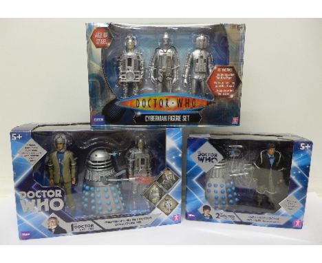 Three Doctor Who action figure sets, The Second Doctor with Dalek, Cyberman and Enemies of the First Doctor