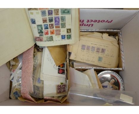 A box of stamps including First Day Covers, pre-decimal and a stamp album 