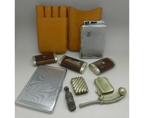 A Colibri combination lighter cigarette case, a leather cigar case, two vesta cases, two whistles, three similar snuff boxes,