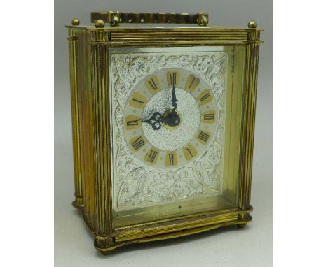 A brass cased Smiths carriage clock, 11.5cm