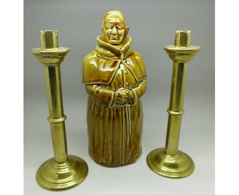 A pair of solid brass candlesticks and an Abbot's Choice whisky decanter