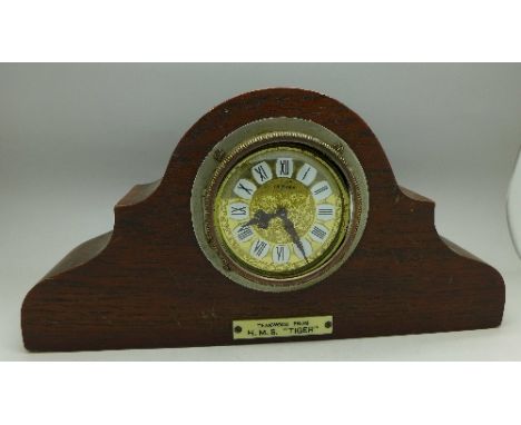 A mantel clock with plaque, Teakwood from H.M.S. Tiger