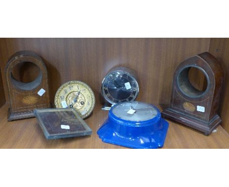 Two inlaid clock cases, a Smiths wall clock, a clock movement and two other clocks