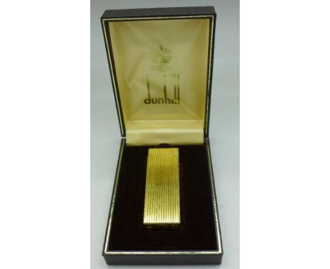 A Dunhill lighter with box