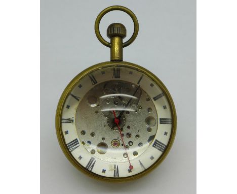 A Swiss made paperweight desk clock with exposed movement dial