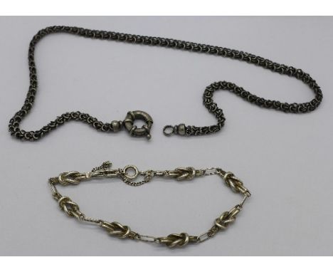 A silver bracelet and a Victorian white metal chain, tests as silver, 38g