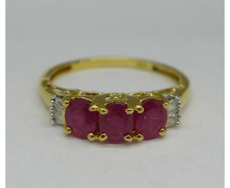 A silver gilt, ruby and diamond ring, N