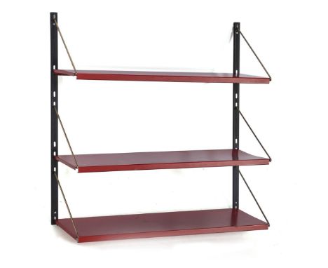 Tjerk ReijengaMetal wall rack with 3 red shelves, blackened wall brackets and brass shelf supports, design Tjerk Reijenga, ex