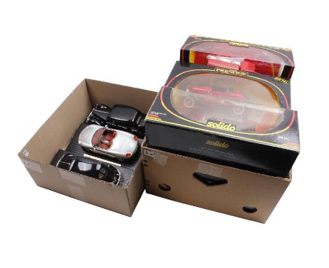 2 boxes with a total of 9 scale model cars