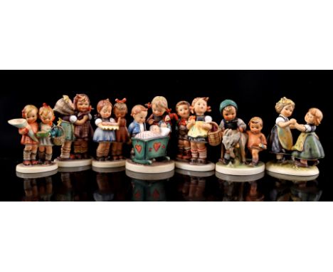 7 Goebel Hummel earthenware sculpture groups, largest 13 cm high