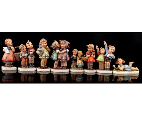 8 Goebel Hummel earthenware statues, largest 14 cm high, with 2 accompanying original boxes