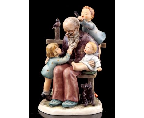 Goebel Hummel earthenware sculpture group entitled 'At Grandpa's', Hum 621, number 06802/10,000, 23 cm high, with accompanyin
