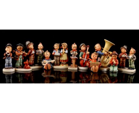 11 various Goebel Hummel earthenware figurines of musical figures, largest 16 cm high, with 3 accompanying original boxes