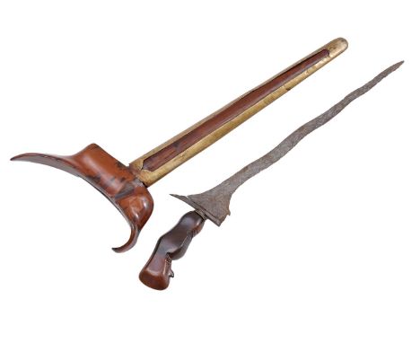 Indonesian (Javanese) Kris Solo in sheath, with a hardwood carved handle (Ukiran Nunggak) and an intermediate ring (Mendak). 