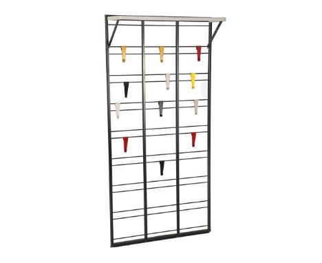 Tjerk ReijengaBlackened metal wall coat rack with 12 coloured hooks and hat shelf, design Tjerk Reijenga, executed by Pilastr