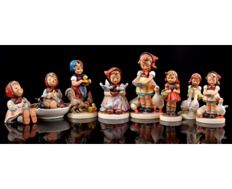 8 Goebel Hummel earthenware statues, largest 15.5 cm high (statue of girl with basket head glued)