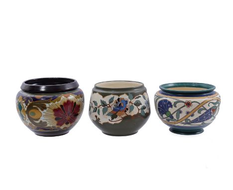 3 Arnhemsche Fayence pottery cachepots with decors Flora, Lindus and Aroe, painters Evert Vos, HM and PH, model numbers 8, 21