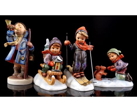4 Goebel Hummel earthenware statues in a winter atmosphere, largest 15 cm high, 2 with accompanying original box
