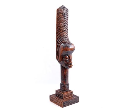 Signed R. Michel, wooden sculpture of a person with ornaments, 91 cm high