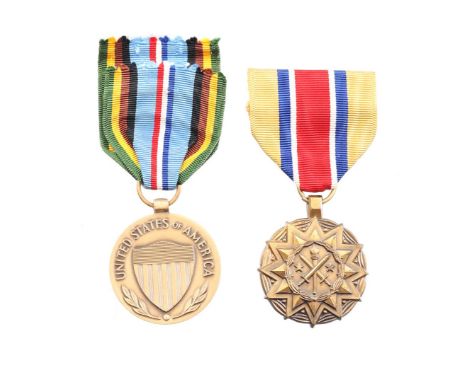 Two beautiful American medals: = (Army) Reserve Good Conduct medal = Armed Forces Expeditionary medal Both medals with the co