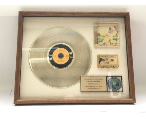 A framed and glazed limited edition gold disc, CD and cassette display in recognition for worldwide sales of the Goodbye Yell