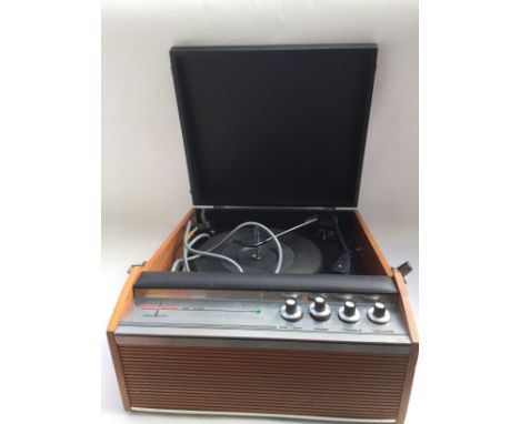 A Corvette De Luxe portable record player.