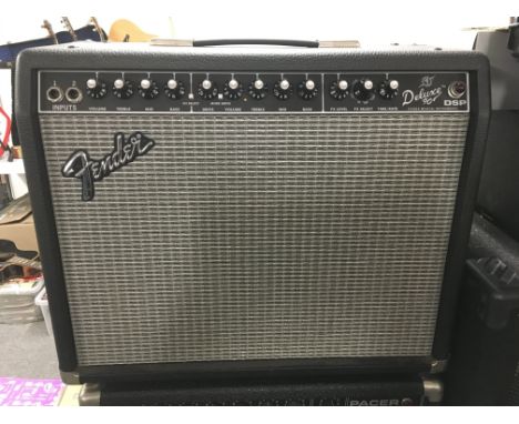 A Fender Deluxe 90 DSP amplifier.