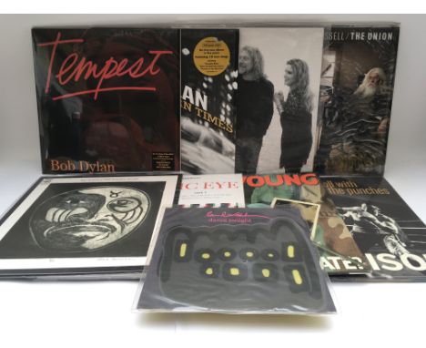 Two bags containing 14 LPs and a shaped 7" single by various artists including Bob Dylan, Robert Plant, Taj Mahal and others.