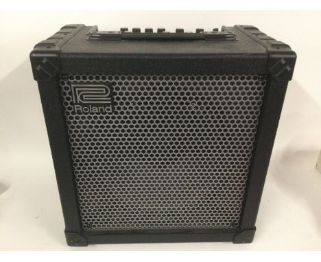 A Roland Cube 60 amplifier.