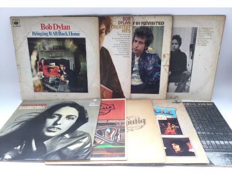 Two bags containing 18 folk rock LPs by various artists including Bob Dylan, Donovan, Neil Young and others. Condition varies