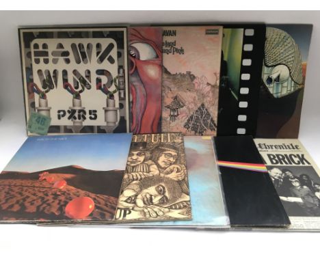 Ten prog rock LPs by various artists including King Crimson, Pink Floyd, Caravan and others. Also includes a Hawkwind ticket 