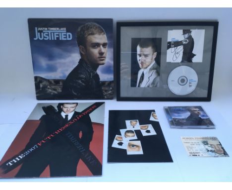 A collection of Justin Timberlake items comprising a signed CD cover, concert program, ticket stub, 'Justified' 2LP etc.